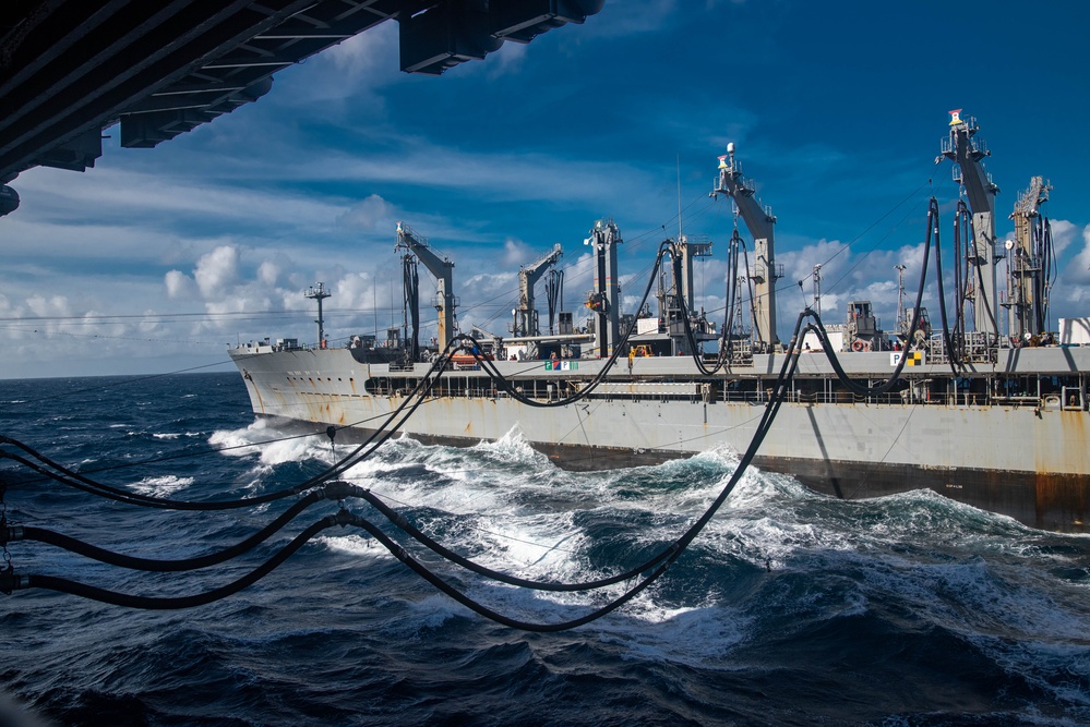 USS Ronald Reagan (CVN 76) conducts a replenishment-at-sea with USNS Rappahannock (T-AO 204)