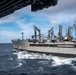 USS Ronald Reagan (CVN 76) conducts a replenishment-at-sea with USNS Rappahannock (T-AO 204)