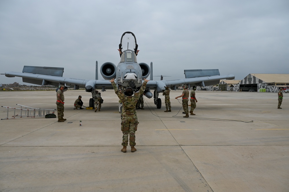 Multi-capable Airman trains on aircraft marshaling