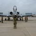 Multi-capable Airman trains on aircraft marshaling