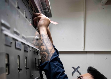 USS Ralph Johnson (DDG 114) Sailors perform VCHT Maintenance.