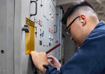 USS Ralph Johnson (DDG 114) Sailors perform VCHT Maintenance.