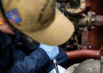 USS Ralph Johnson (DDG 114) Sailors perform VCHT Maintenance.