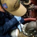 USS Ralph Johnson (DDG 114) Sailors perform VCHT Maintenance.