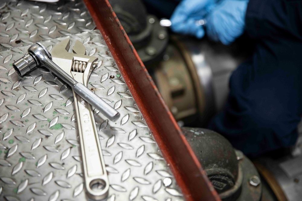 USS Ralph Johnson (DDG 114) Sailors perform VCHT Maintenance.