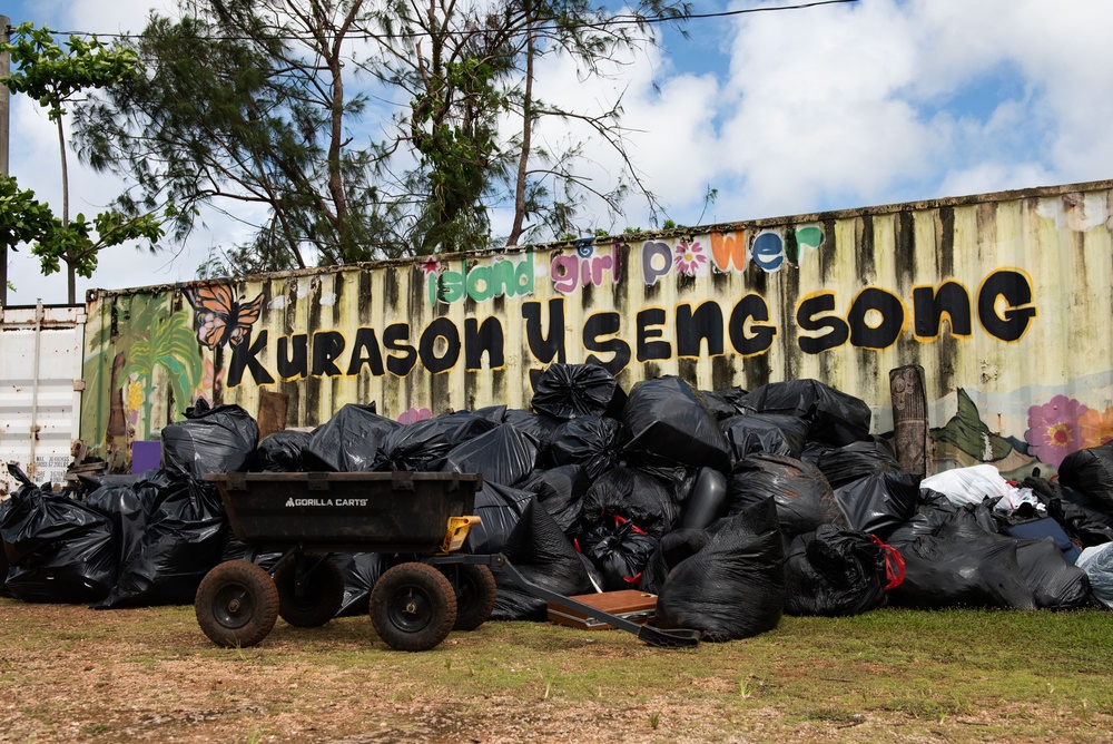 Piles of Typhoon Debris bagged for disposal during a multi-national community outreach project on Guam