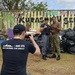 Sailors from the Republic of Korea Navy take a photo with U.S. Navy sailors during a volunteer project