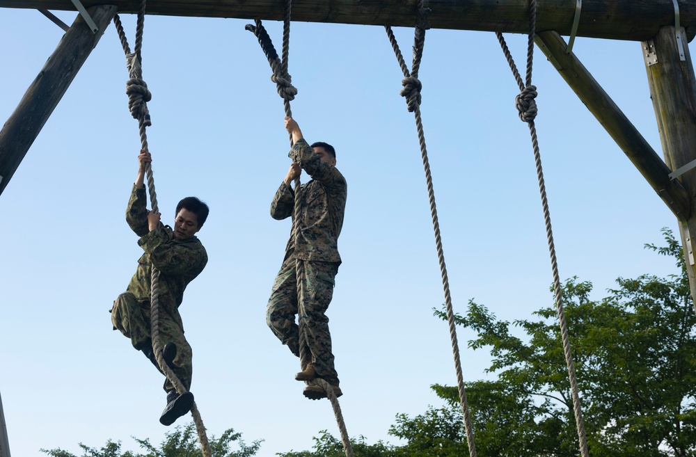 U.S. Marines and JGSDF soldiers conduct a NCO Symposium