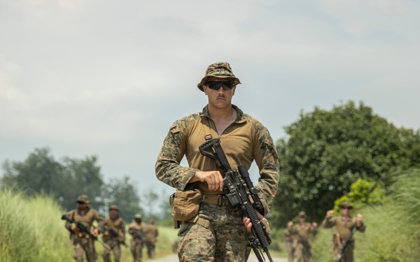 U.S. Marines provide lifesaving aid to local civilian during Marine Aviation Support Activity 23