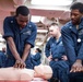 Sailors practice CPR techniques aboard the Arleigh Burke-class guided-missile destroyer USS Ralph Johnson (DDG 114).