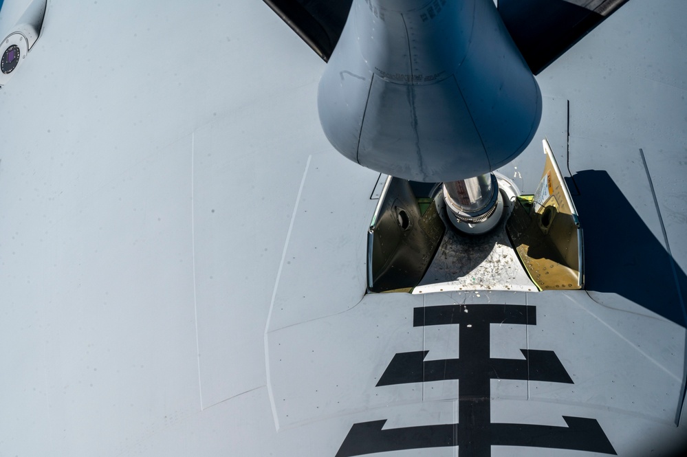 MG23: KC-135 refuels KC-46