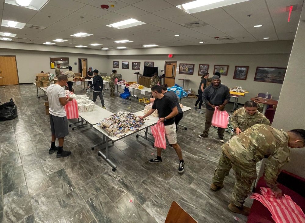 Chapel Hike 94: JTF-Bravo volunteers hike 5,000 pounds of food to remote community