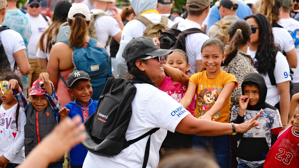 Chapel Hike 94: JTF-Bravo volunteers hike 5,000 pounds of food to remote community