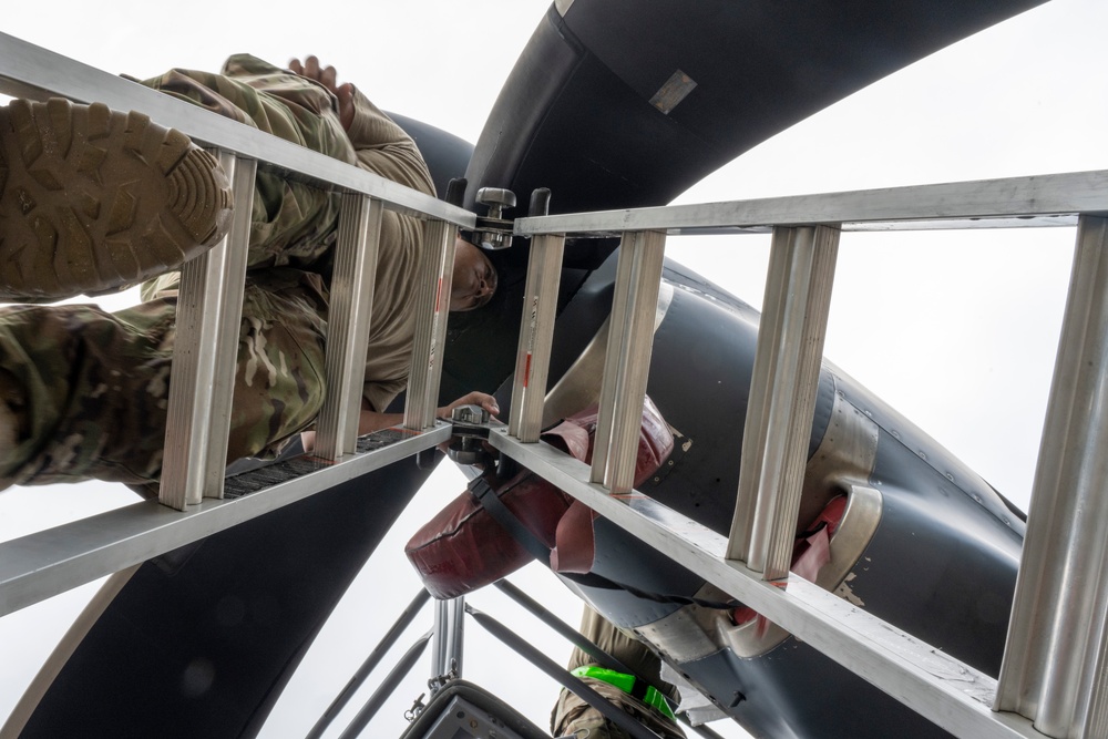 901 SOAMXS airmen carry out routine maintenance on MC-130J