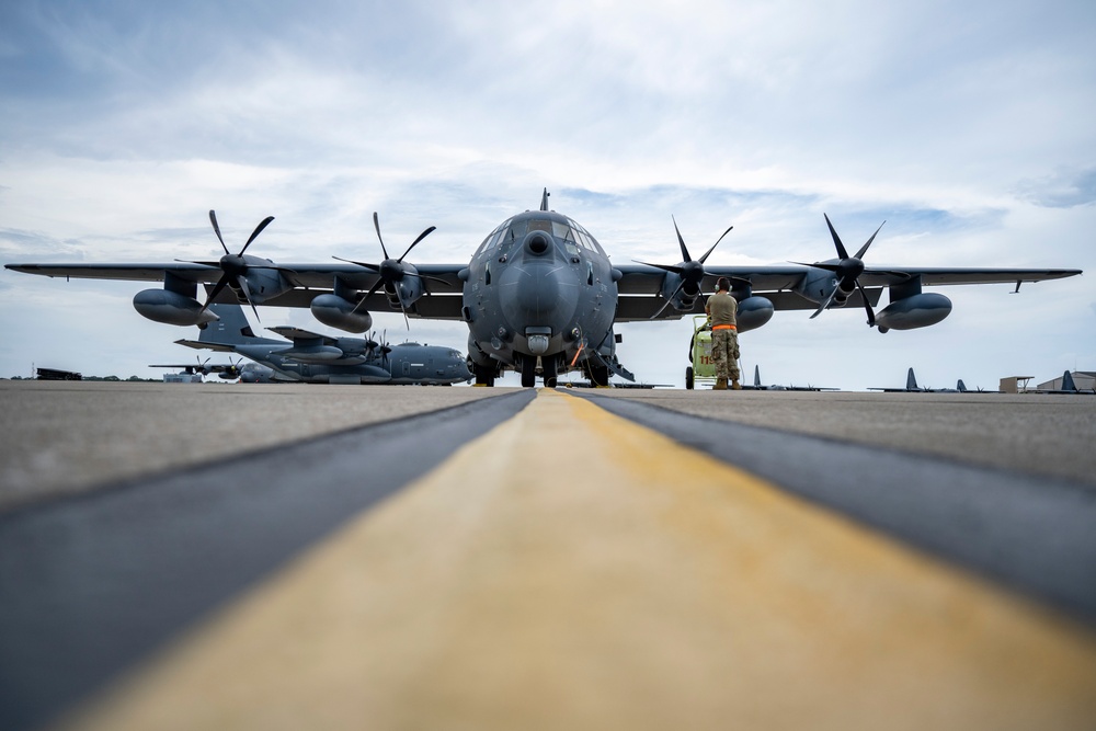 901 SOAMXS airmen carry out routine maintenance on MC-130J