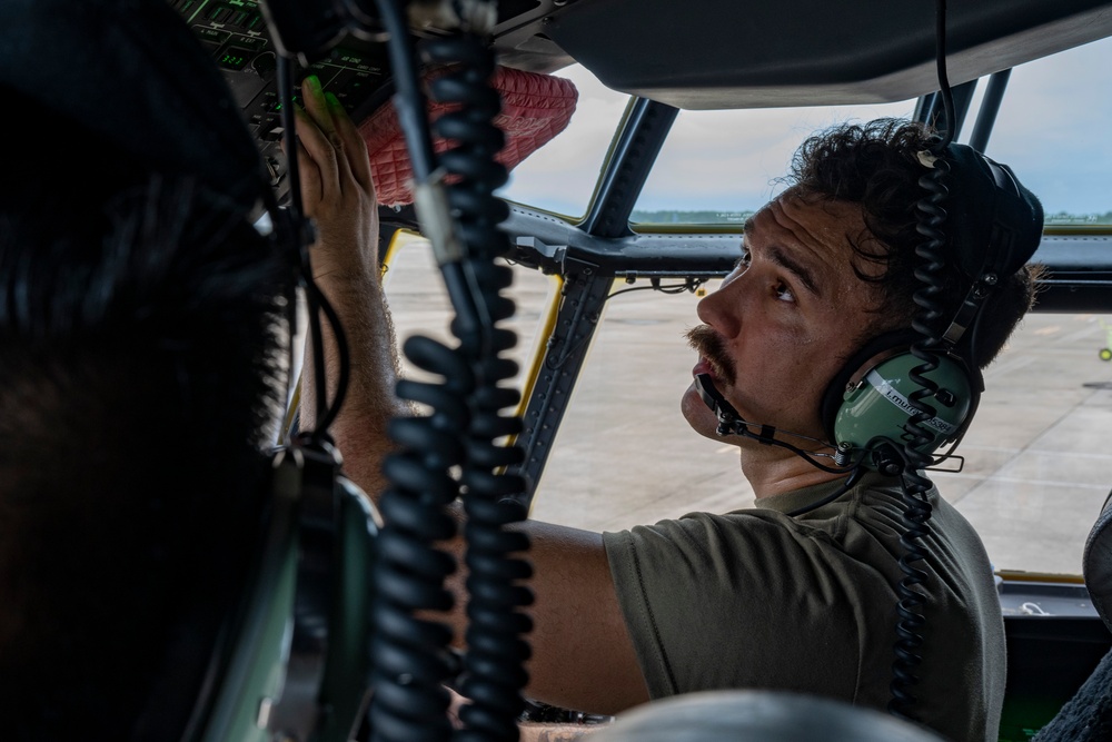 901 SOAMXS airmen carry out routine maintenance on MC-130J