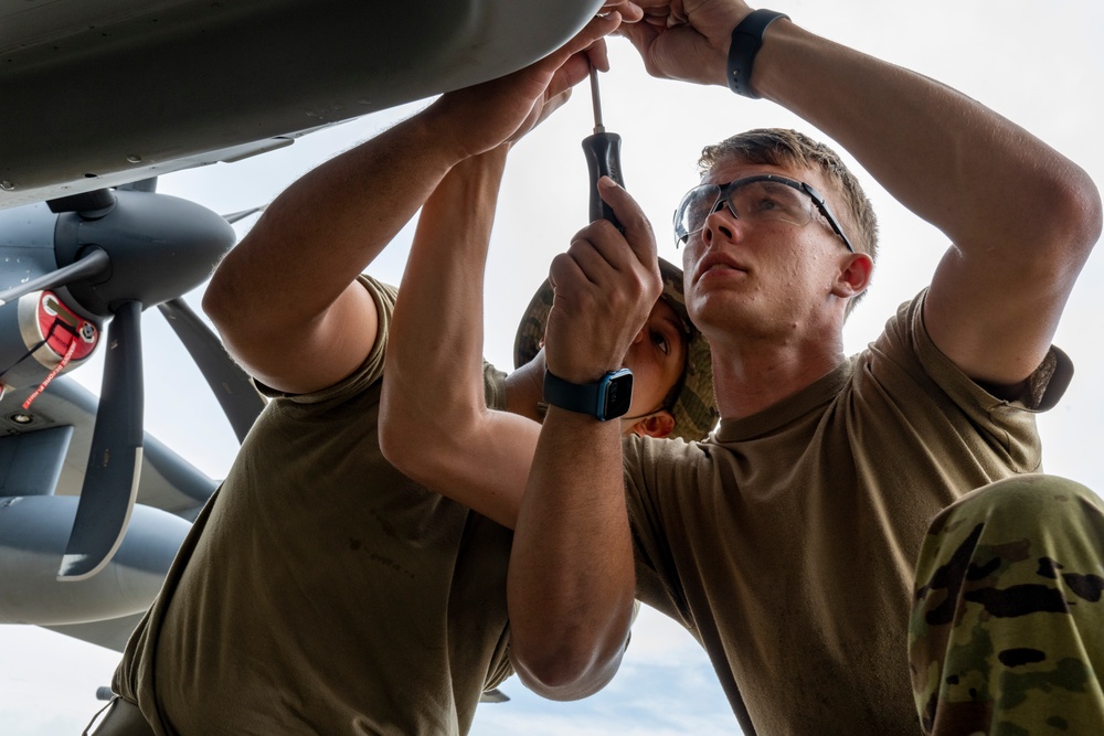 901 SOAMXS airmen carry out routine maintenance on MC-130J