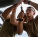 901 SOAMXS airmen carry out routine maintenance on MC-130J