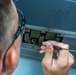 901 SOAMXS airmen carry out routine maintenance on MC-130J