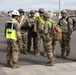 Chief Warrant Officer 2 John Young briefs Soldiers at the Port of Gladstone, Australia.