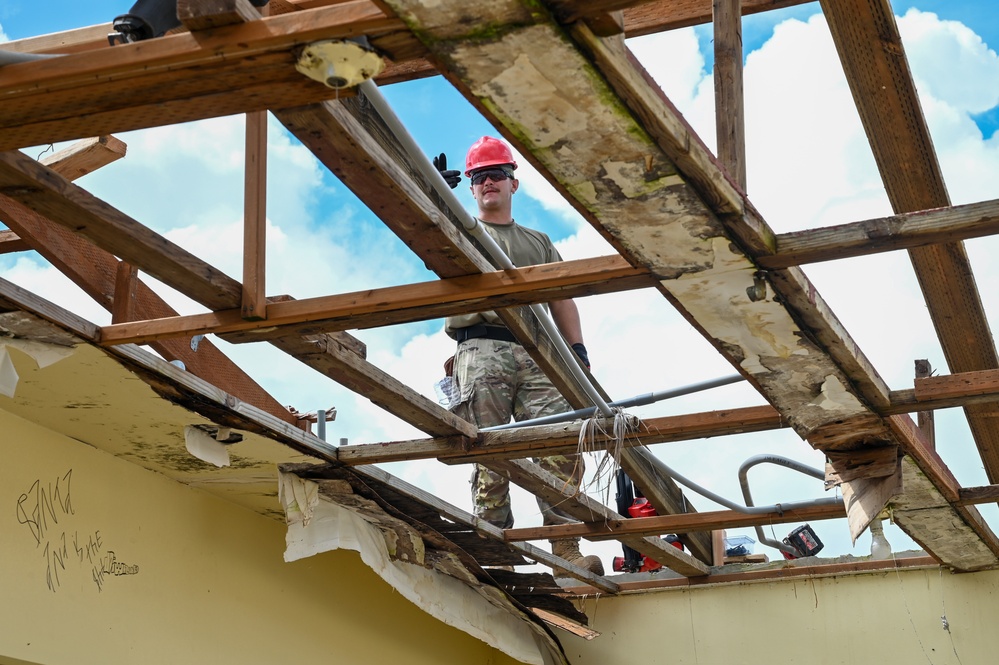 36 CRG and 554 RHS repair roofs in the Guam community