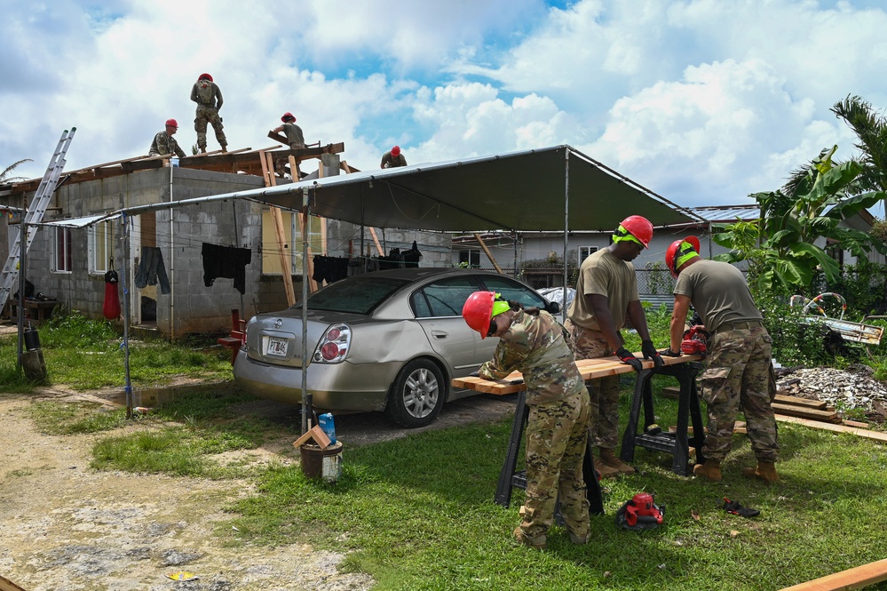 36 CRG and 554 RHS repair roofs in the Guam community