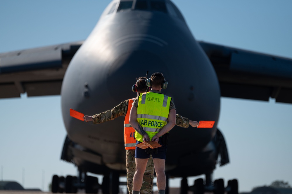 U.S. Air Force C-5 Galaxy delivers U.S. Marine helicopters to Australia