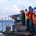 USS Robert Smalls (CG 62) Sailors Stand At Parade Rest before RAS