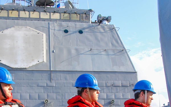 USS Robert Smalls (CG 62) Sailors Hold the Line during RAS