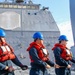 USS Robert Smalls (CG 62) Sailors Hold the Line during RAS