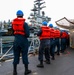 USS Robert Smalls (CG 62) Sailors Hold the Line during RAS with USS Ronald Reagan