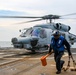 USS Robert Smalls (CG 62) Sailors Grabs Chock and Chains during Flight Quarters