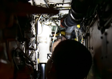 USS Carl Vinson (CVN 70) Sailor Conducts Routine Maintenance