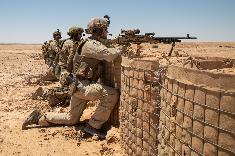 Norwegian soldiers conduct a live-fire exercise at Al Asad Air Base