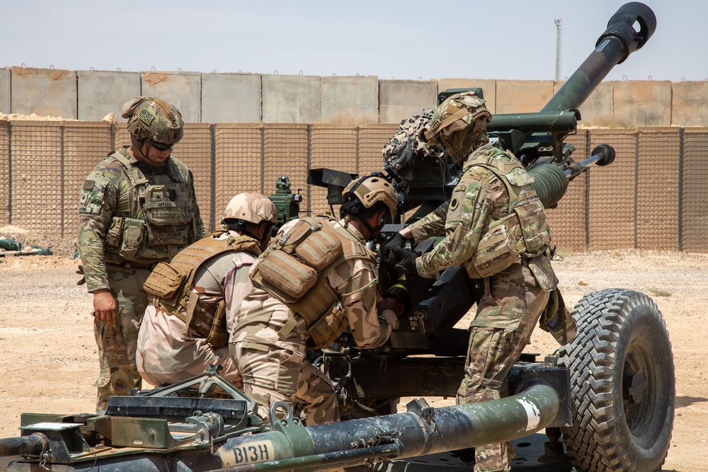 Coalition forces conduct Howitzer live-fire exercise at Al Asad Air Base