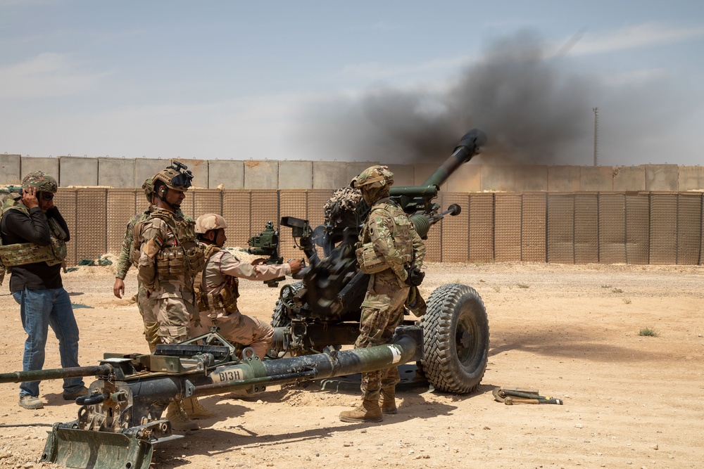 Coalition forces conduct Howitzer live-fire exercise at Al Asad Air Base