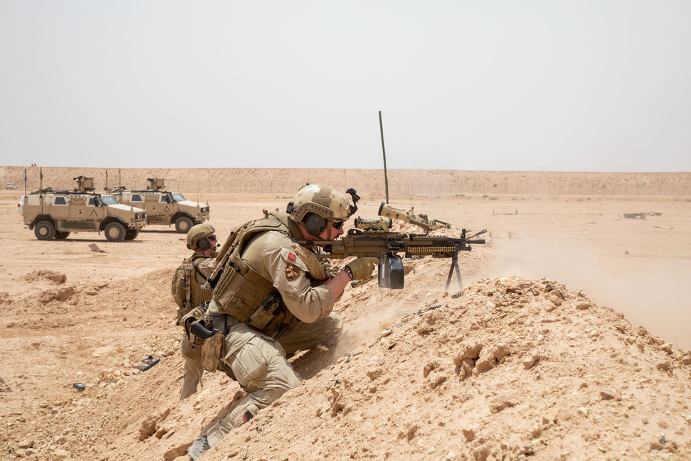 Norwegian soldiers conduct a live-fire exercise at Al Asad Air Base