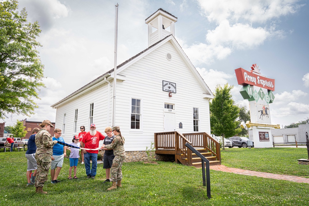 Missouri Honor Guard teach children about flag folding