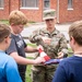 Missouri Honor Guard teach children about flag folding