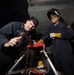 BATAAN SAILORS INSTALL A FAN COIL UNIT