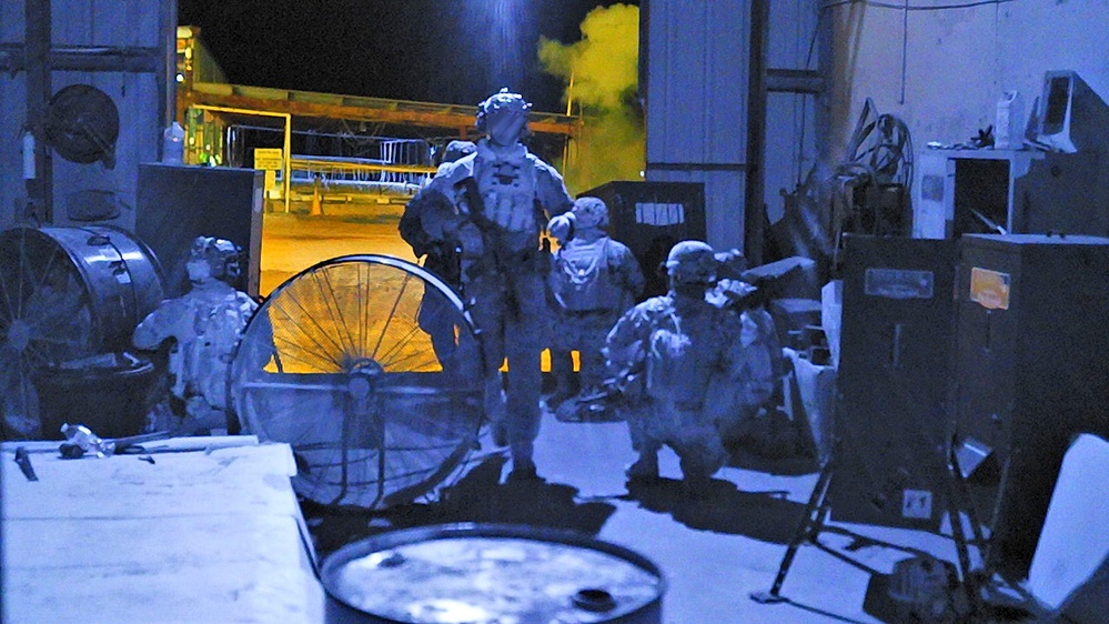 Marine Raiders conduct a direct action raid during Exercise Raven