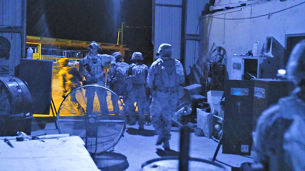 Marine Raiders conduct a direct action raid during Exercise Raven