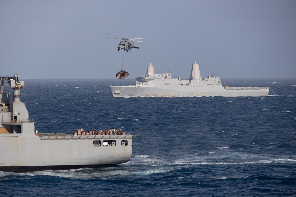 Aircraft Replenishes USS America at Sea