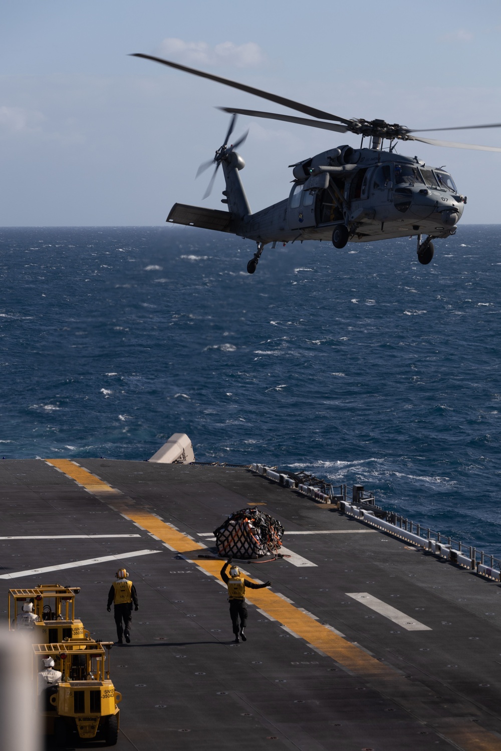 Aircraft Replenishes USS America at Sea