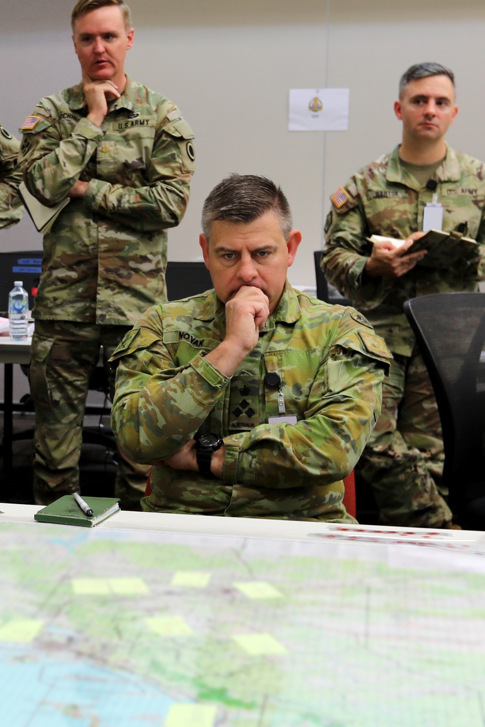 Brigadier Gregory Novak, 6th Combat Support Brigade commander, Australian Army, receives Task Force 660’s first official brief of Talisman Sabre 23