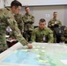 Brigadier Gregory Novak, 6th Combat Support Brigade commander, Australian Army, receives Task Force 660’s first official brief of Talisman Sabre 23