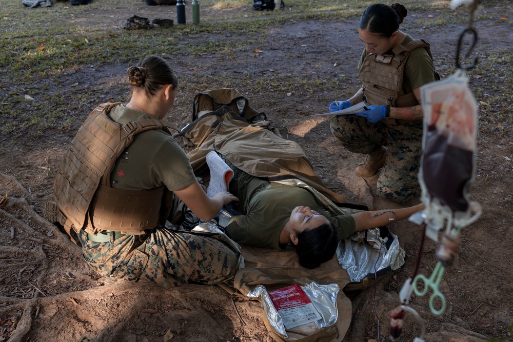 MRF-D Navy Corpsmen practice blood drawing alongside U.S. and Australian Army Soldiers