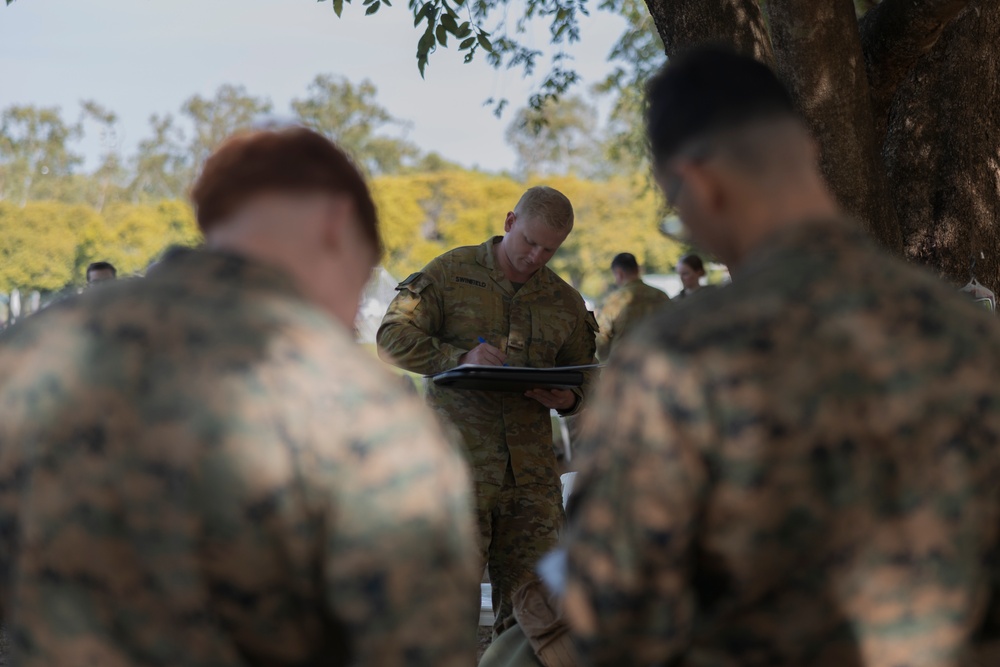 MRF-D Navy Corpsmen practice blood drawing alongside U.S. and Australian Army Soldiers