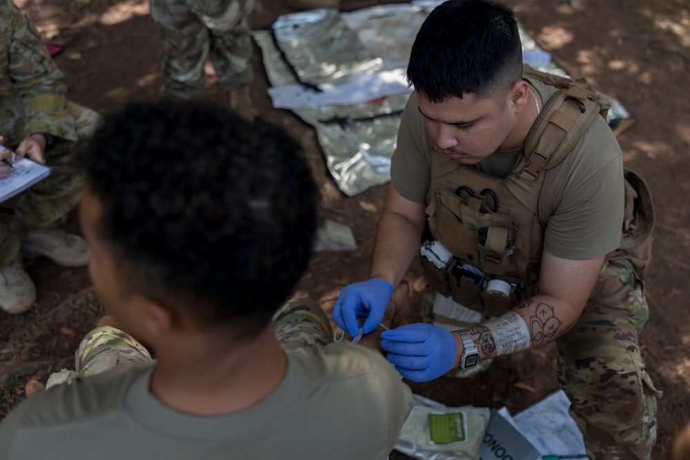 MRF-D Navy Corpsmen practice blood drawing alongside U.S. and Australian Army Soldiers