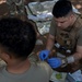 MRF-D Navy Corpsmen practice blood drawing alongside U.S. and Australian Army Soldiers